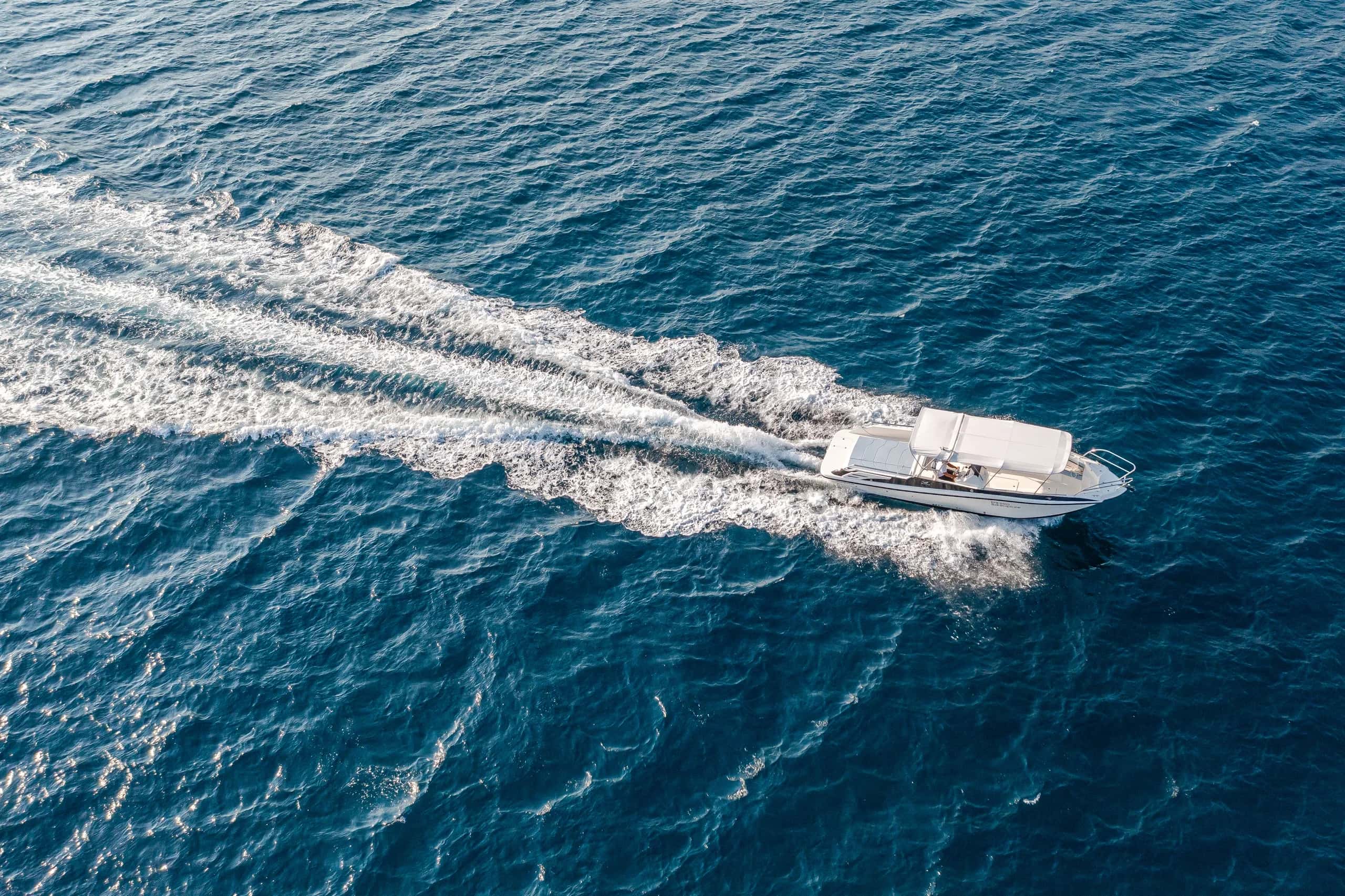 SeaExplore speedboat cutting across the deep-blue Adriatic, seen from above