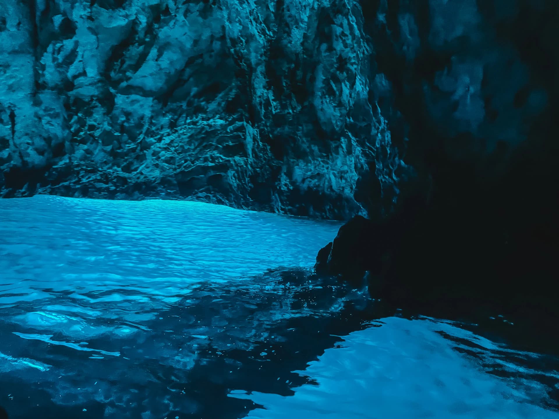 The glowing blue interior of the Blue Cave (Modra špilja) on Biševo