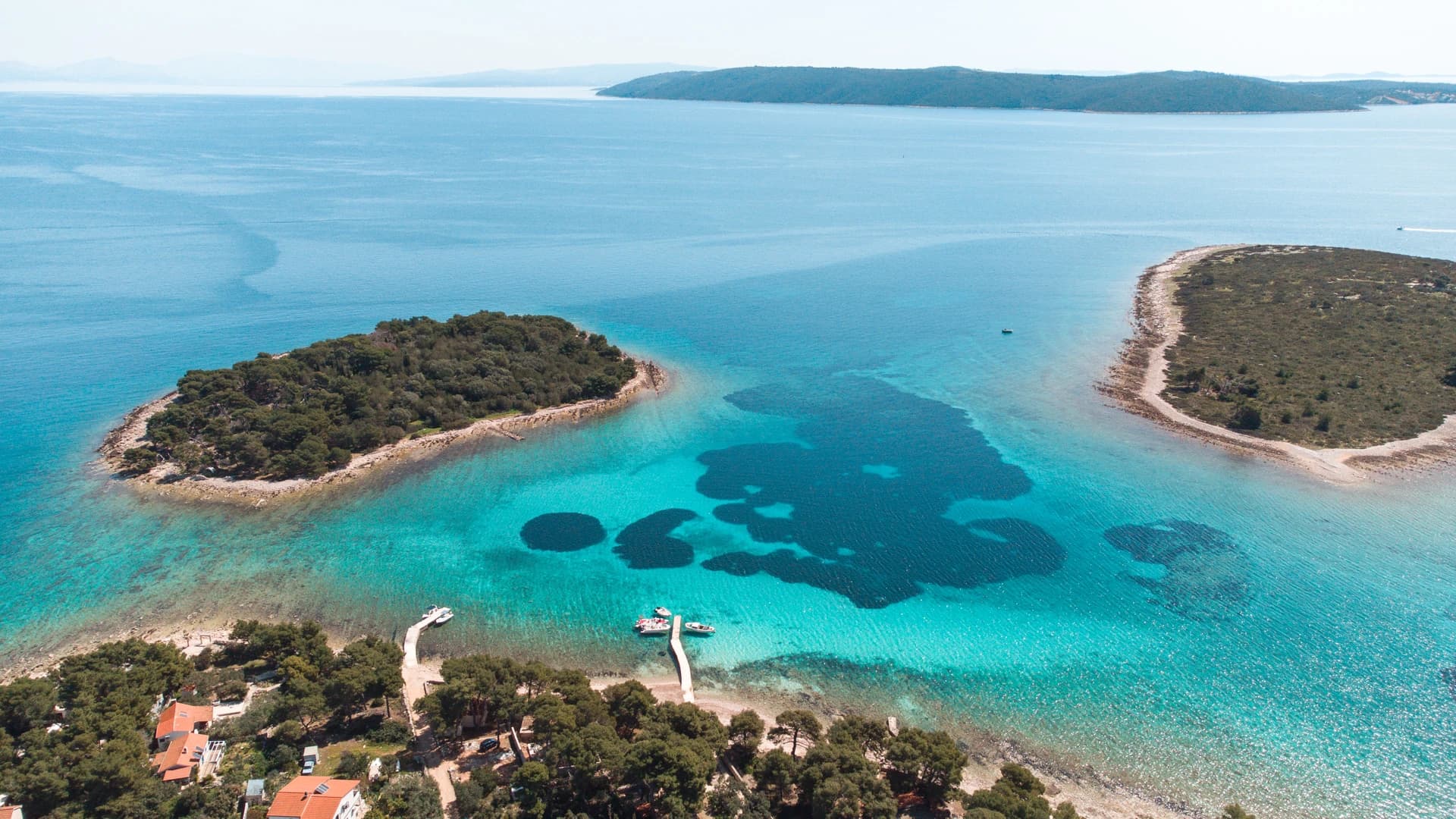 Aerial view of the turquoise Blue Lagoon near Drvenik