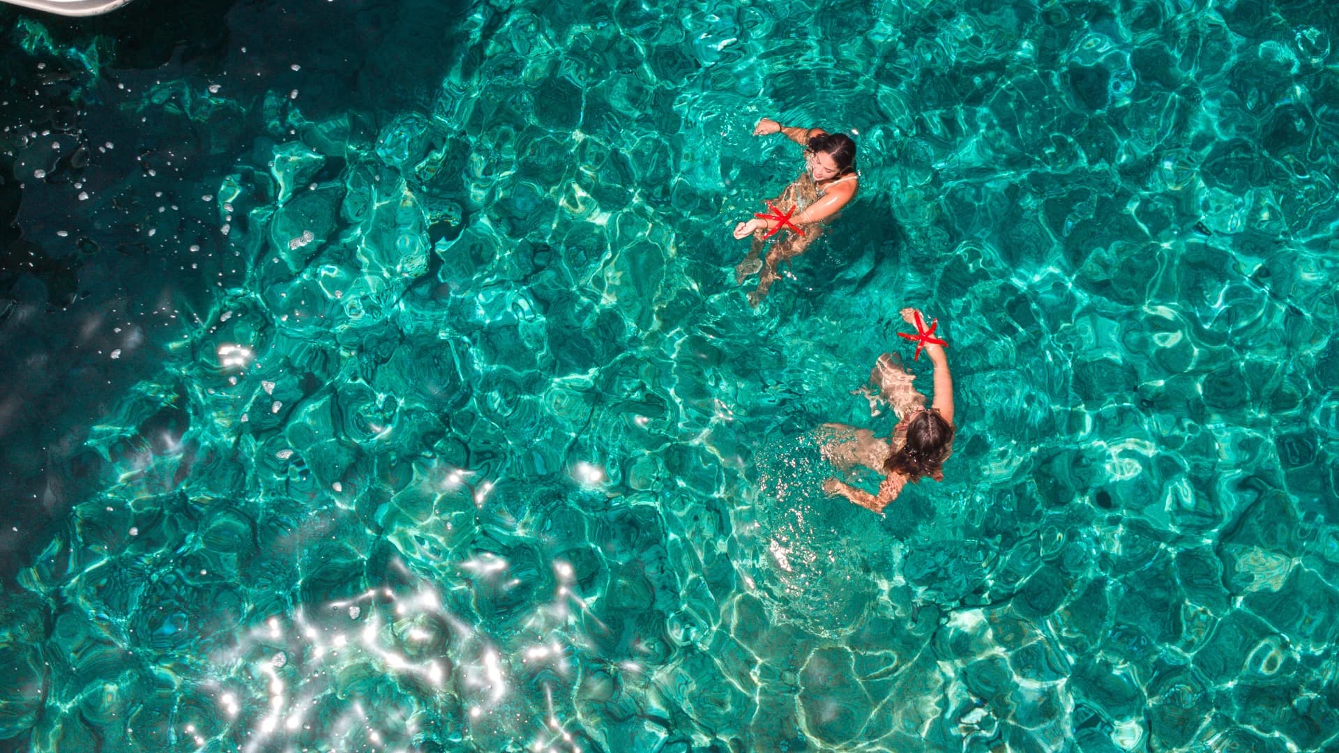 Snorkelling in the crystal-clear water of the Blue Lagoon