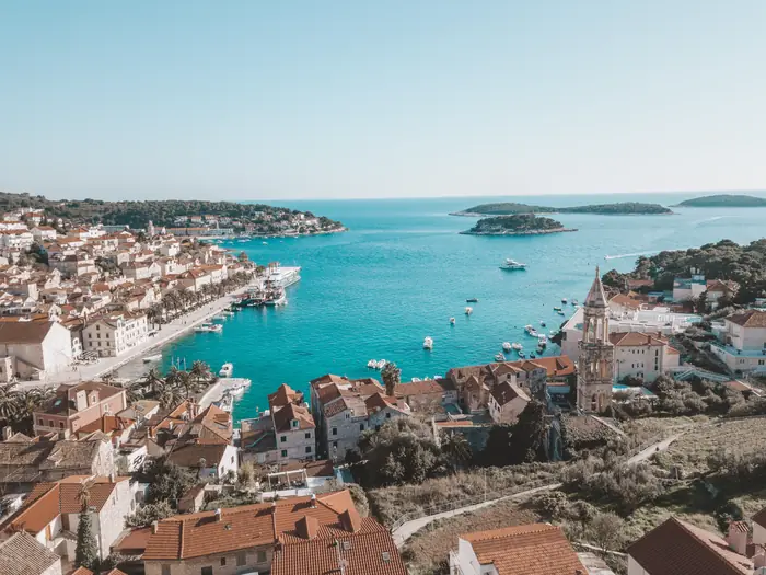 Drone shot of a Dalmatian island coastline and calm sea