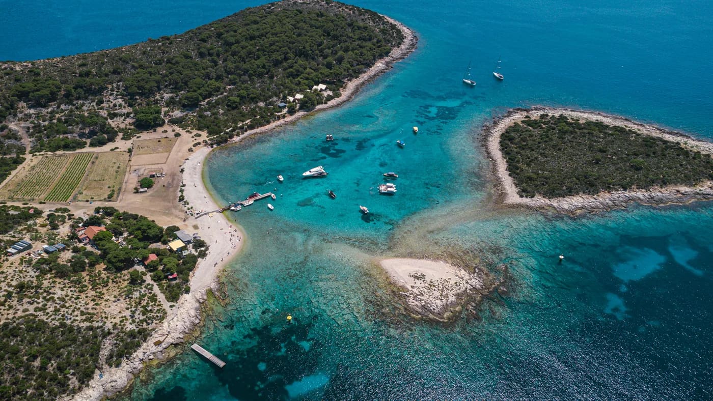 Cliffs and deep-blue water in the Vis archipelago