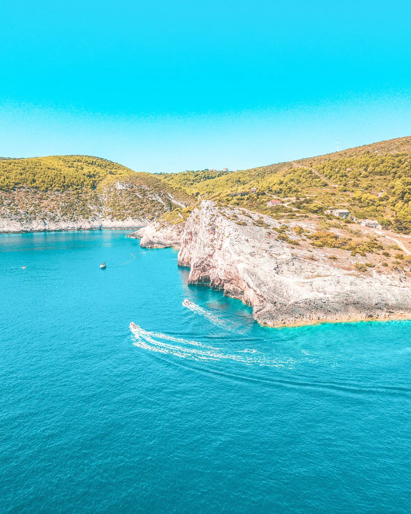 Dramatic cliffs and deep-blue water near the Blue Cave