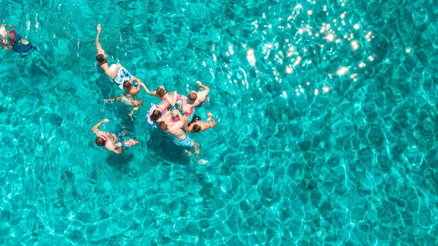 Boats anchored over the turquoise Blue Lagoon