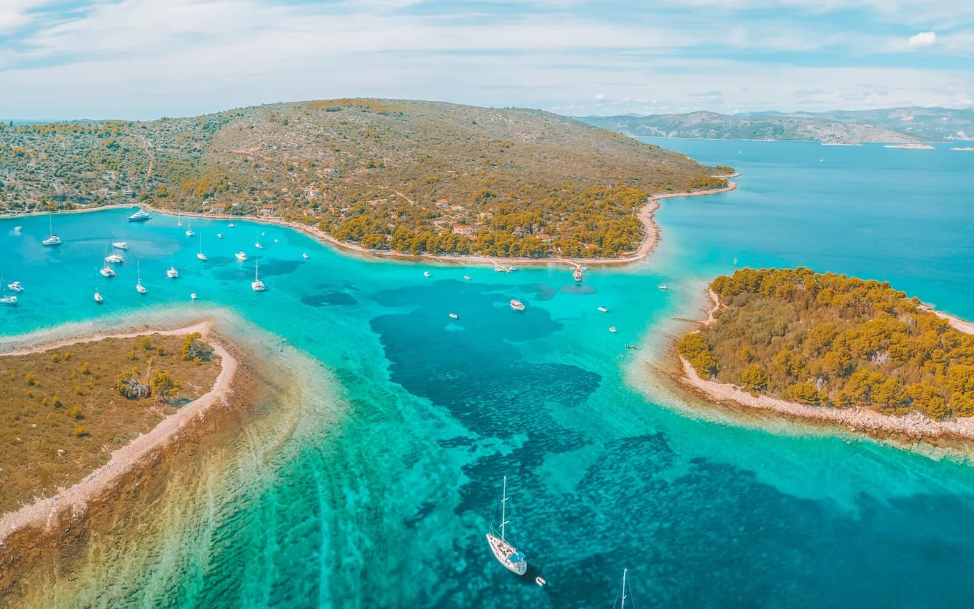 Clear water and pine islets of the Drvenik area